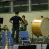 Brother Elliott helping a student with technique on the snare drum