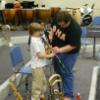 Brother Keil helping students with clarinet